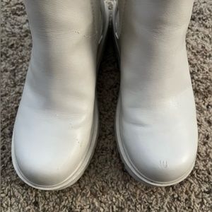 Boots I got from Amazon, two scratches one from my cat and the other is a scuff